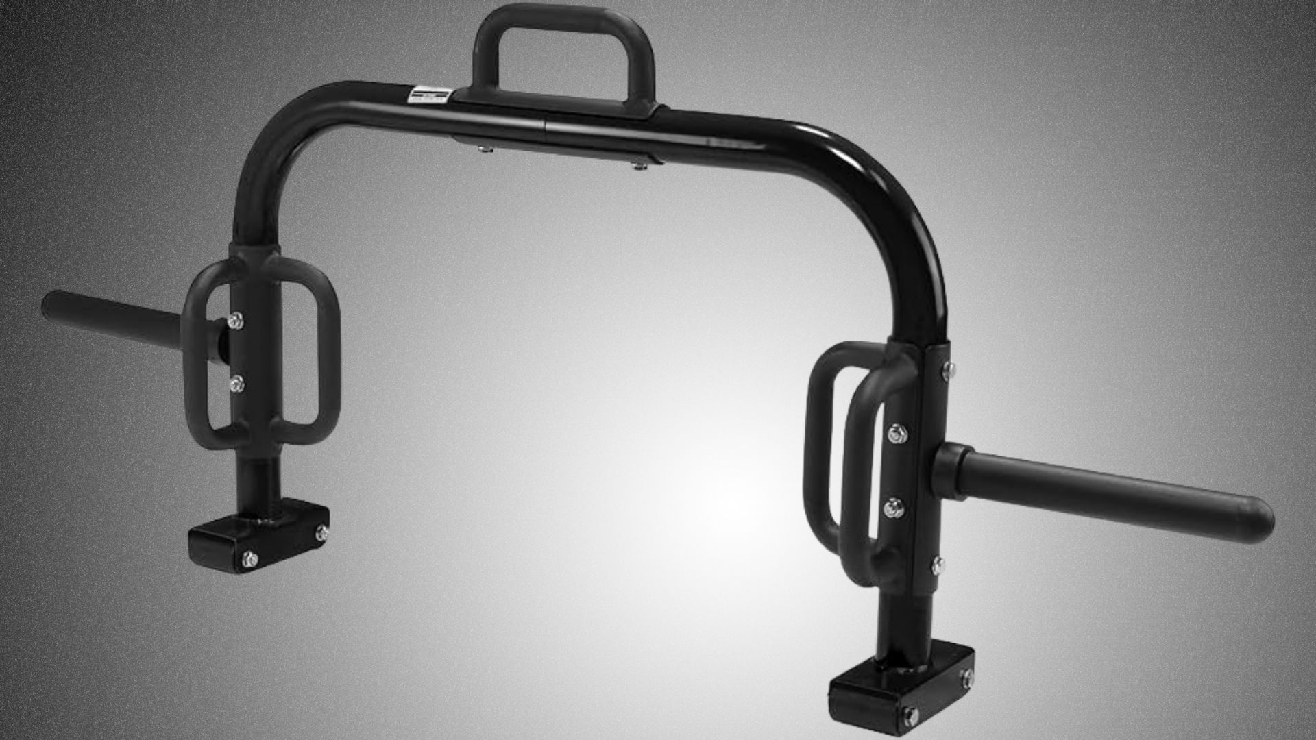 Black and white image of an open hex bar with a handle, commonly used for weightlifting exercises.