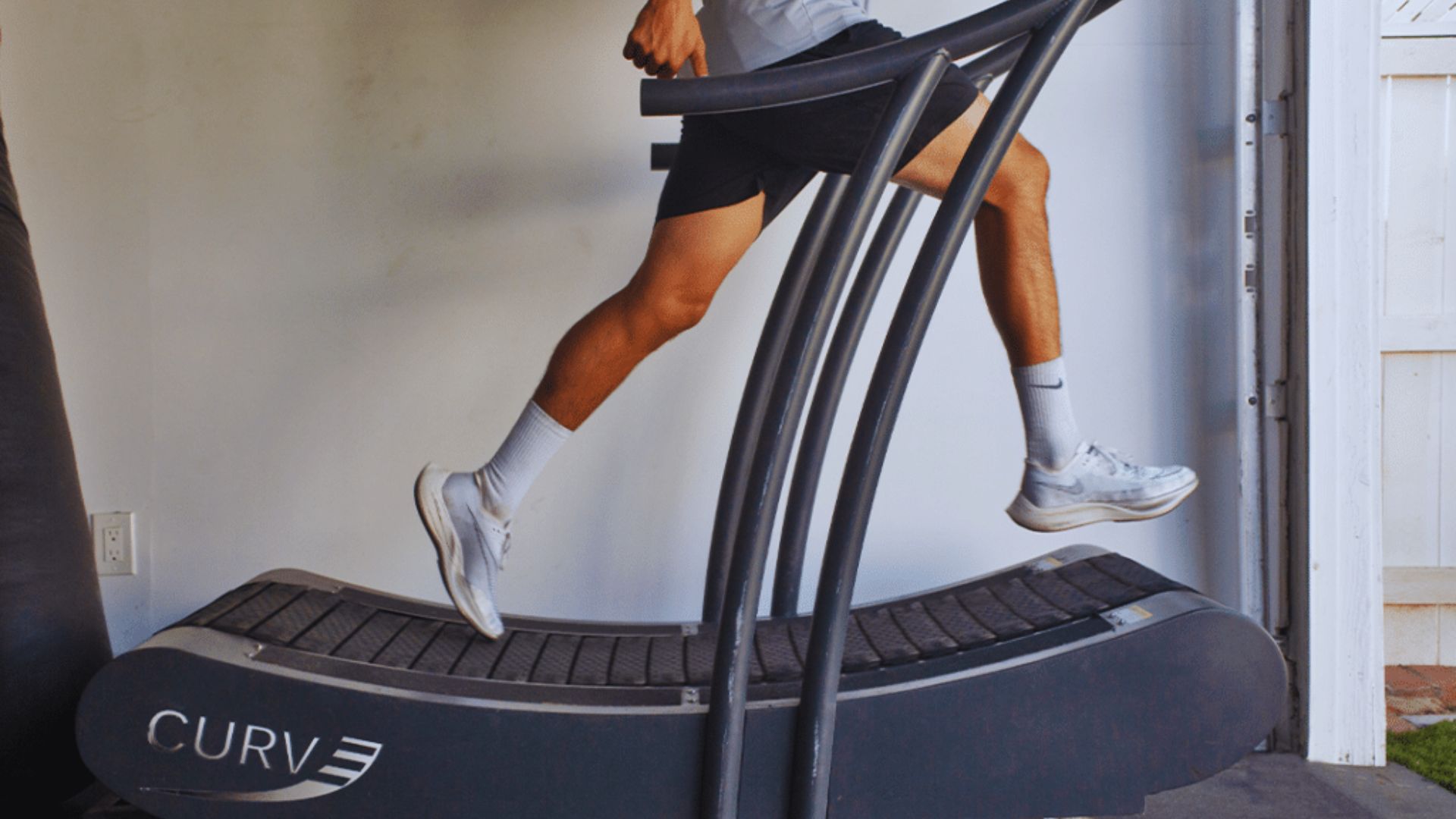 A man runs on a treadmill.