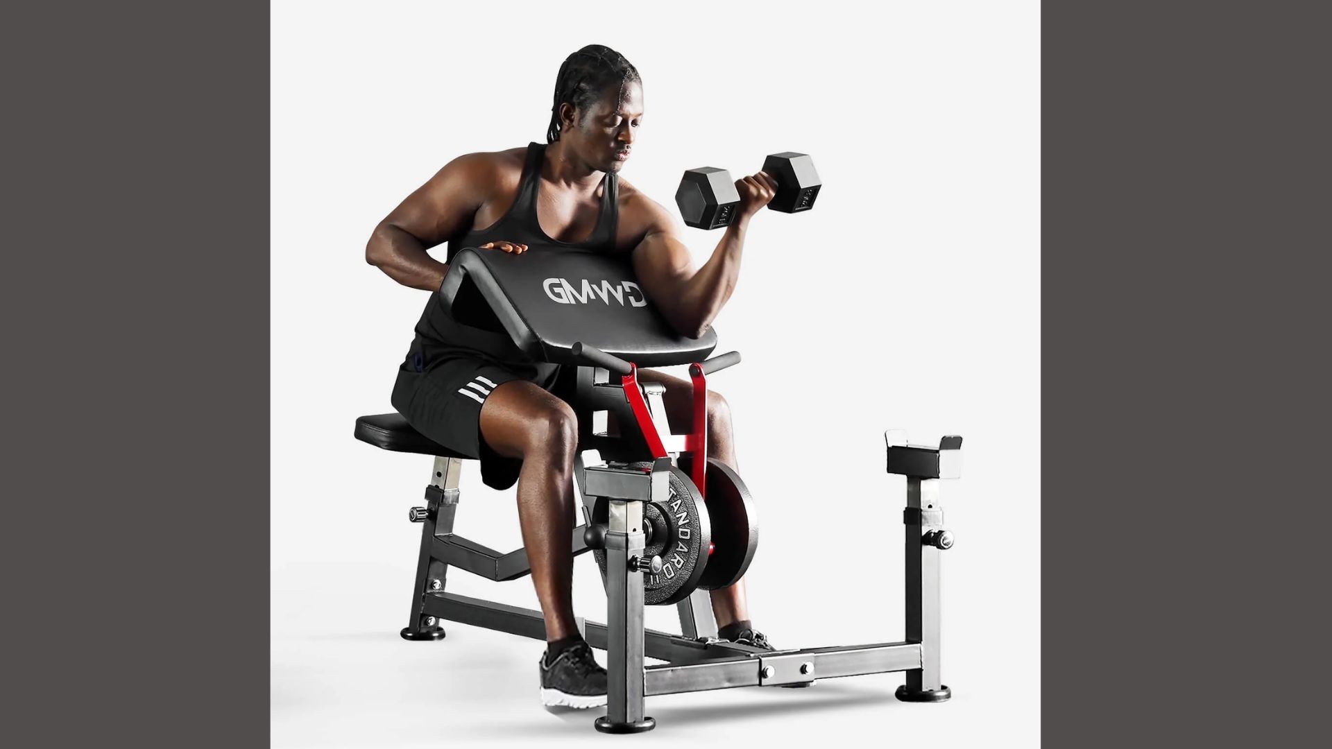 A woman exercises with a dumbbell while seated on a bench in a gym setting.