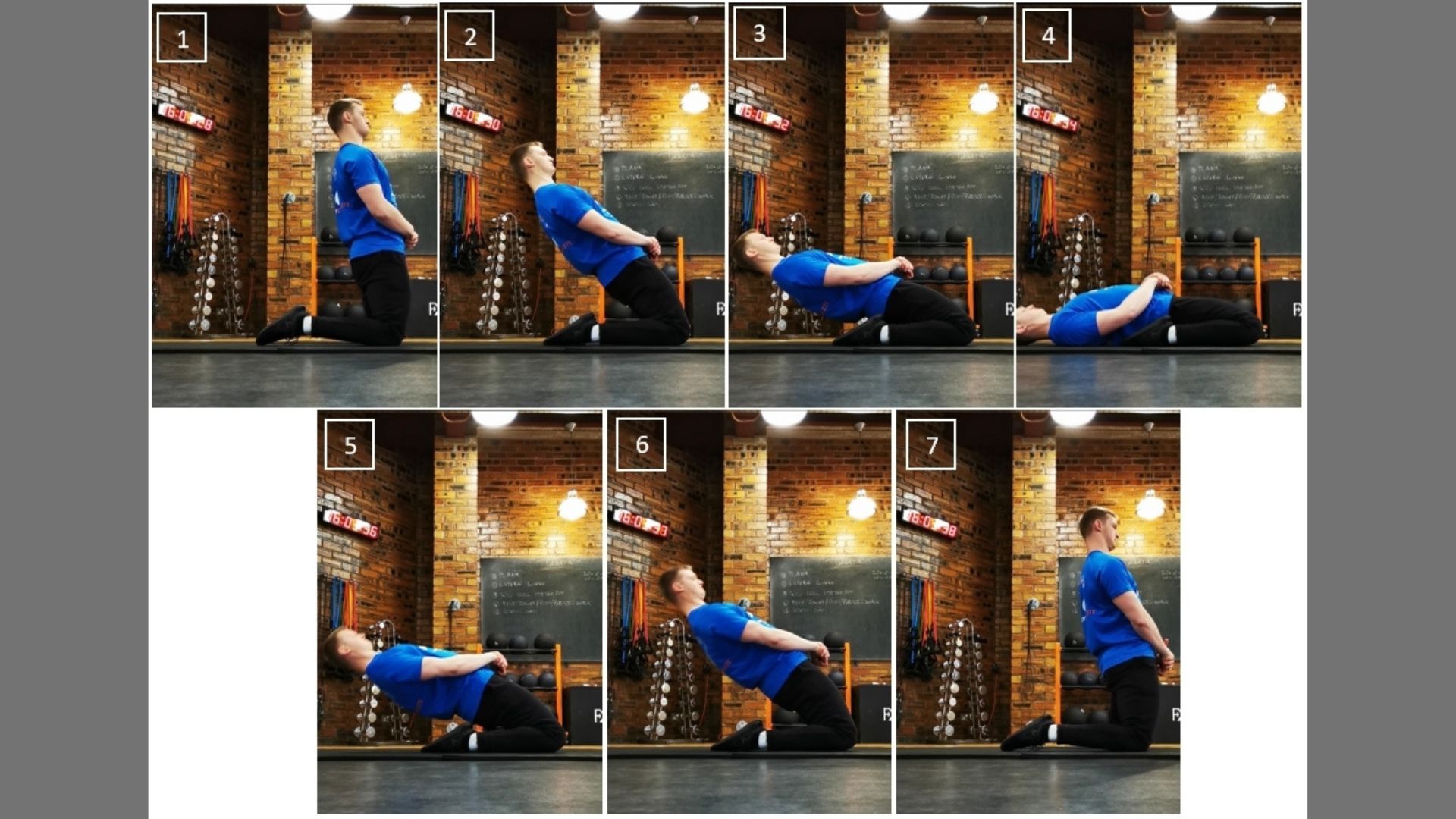 A man executing a squat in front of a rustic brick wall.