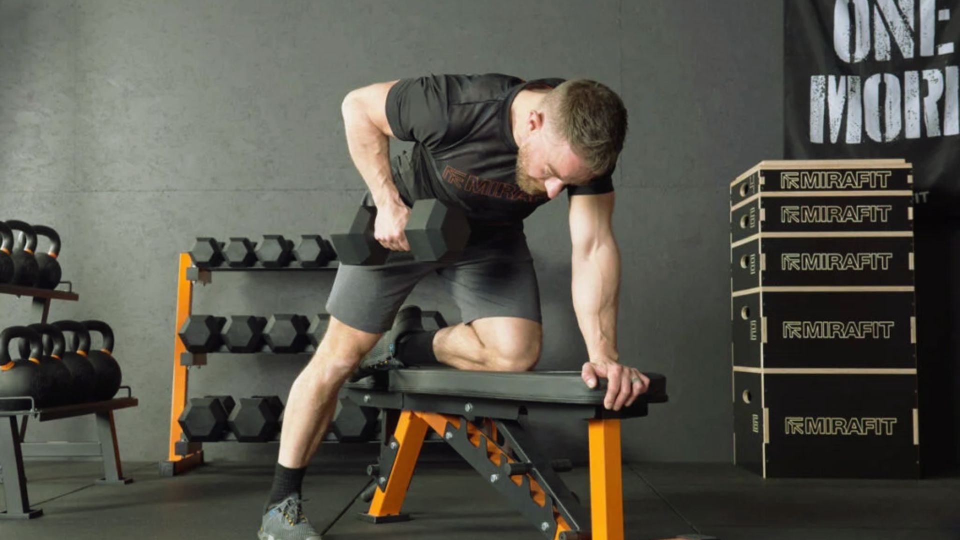 A man performs a workout on a bench, focusing on strength training exercises.