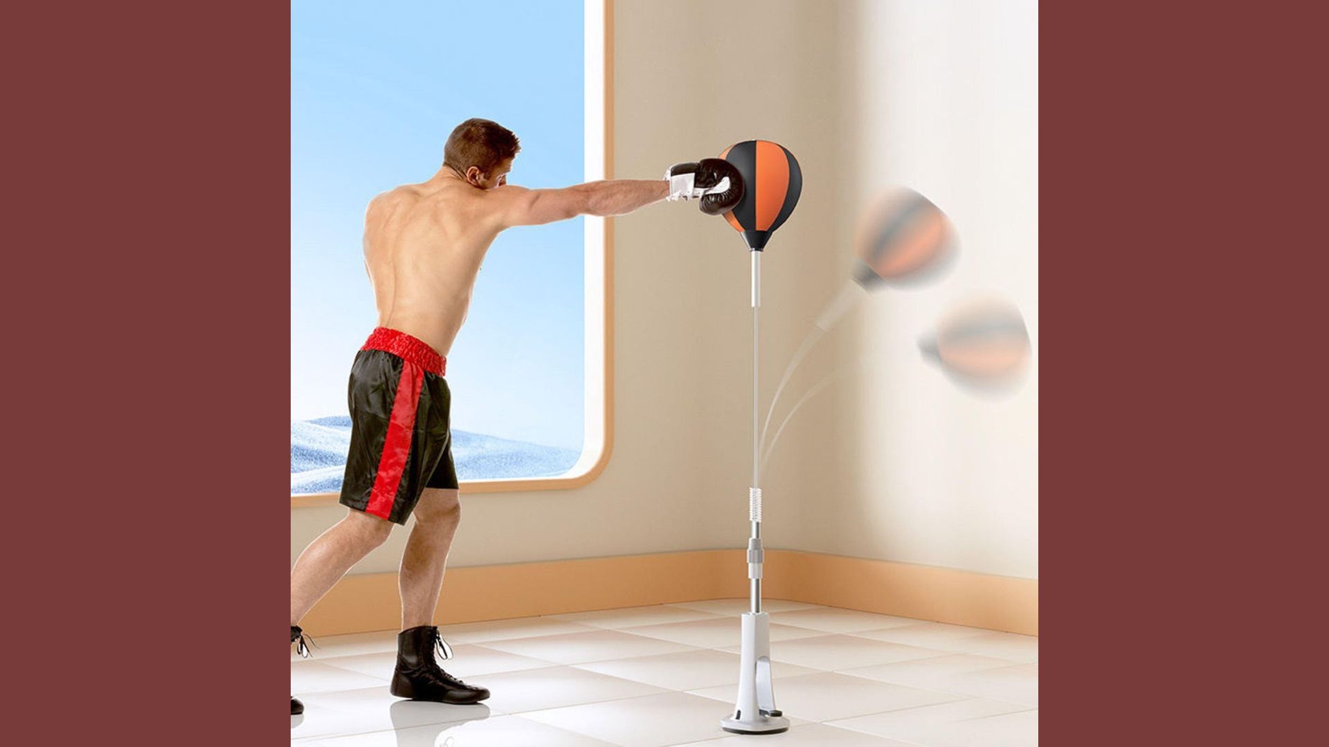 A man strikes a punching bag with a ball, demonstrating strength and focus during a workout session.