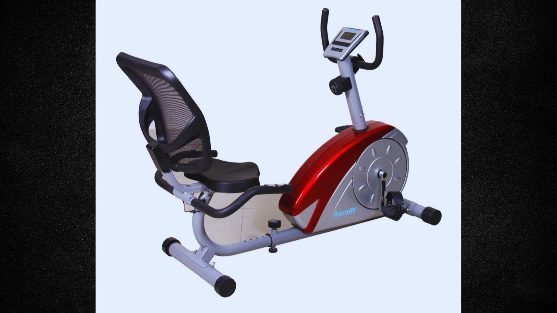 A red and black exercise bike featuring a comfortable seat, designed for indoor cycling workouts.