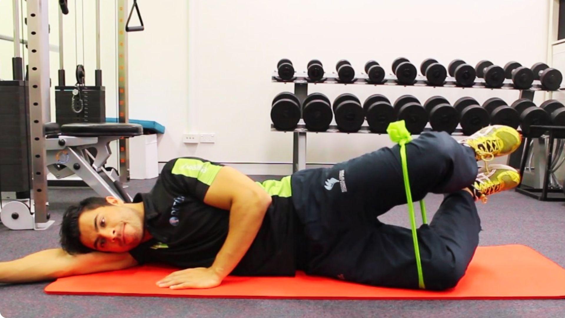 Elevated feet clam shell exercise to increase glute engagement and hip control
