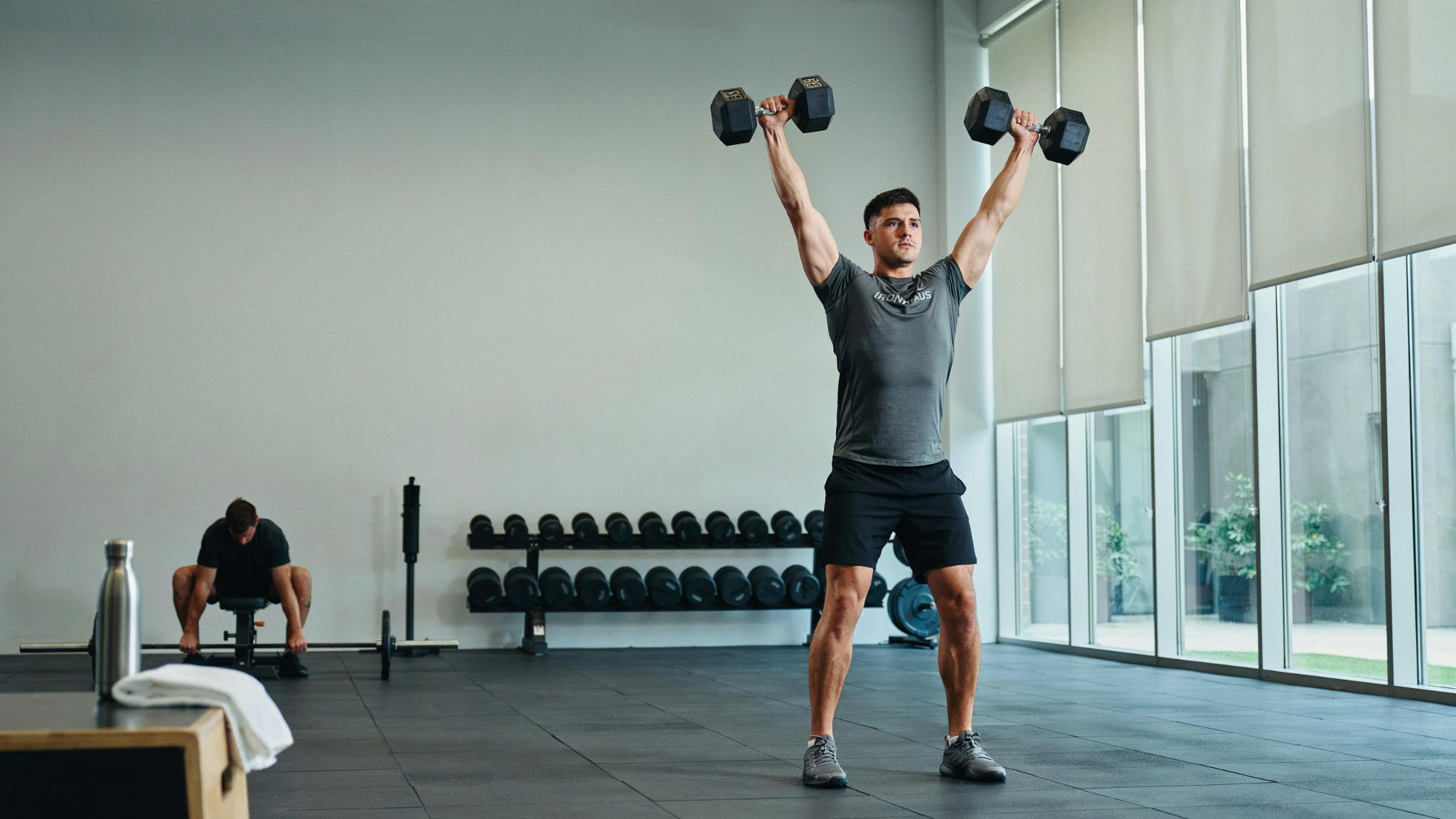 Overhead dumbbell shoulder press exercise.