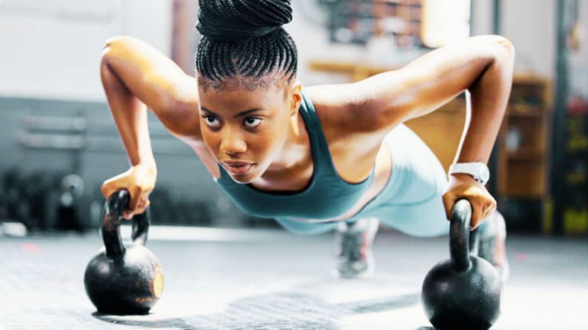 Athlete performing controlled repetitions while focusing on muscle activation during a gym workout.