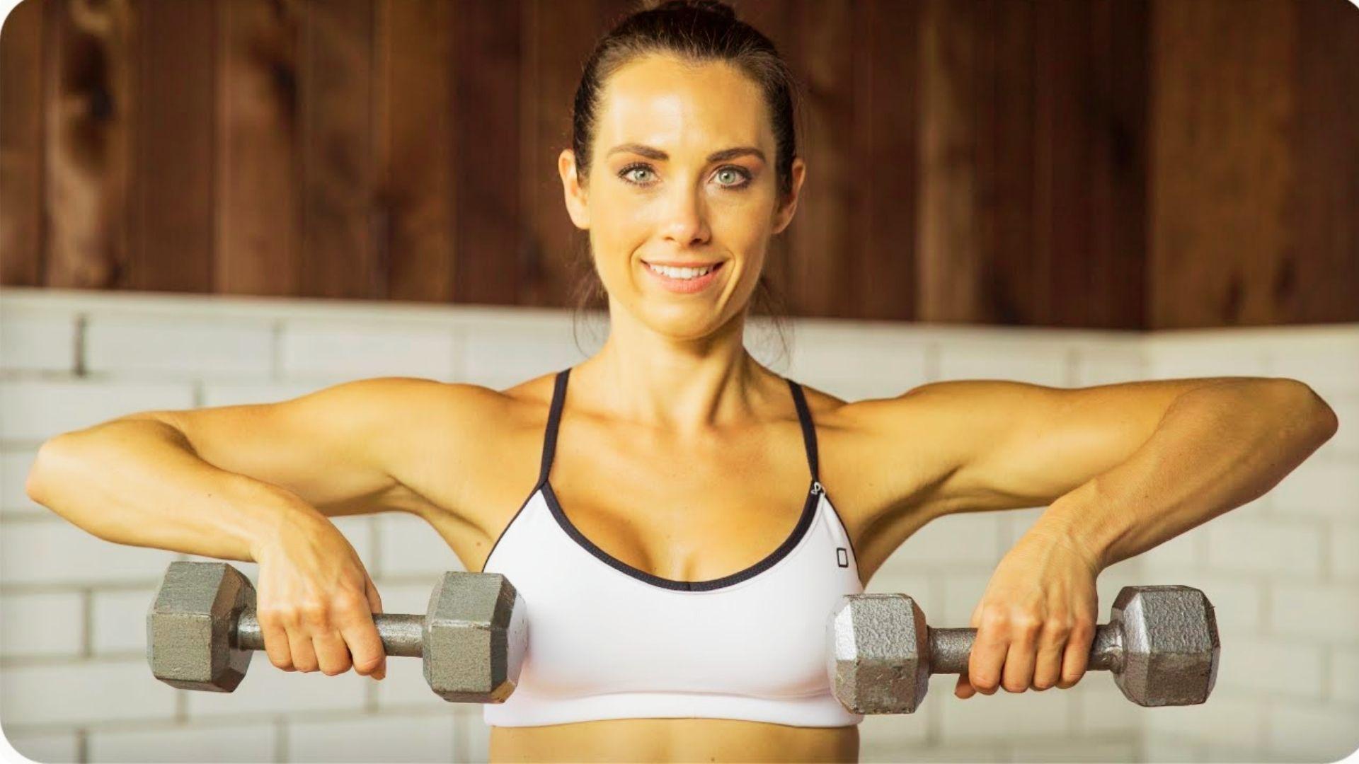 Upright row exercise using barbell targeting shoulders and upper traps