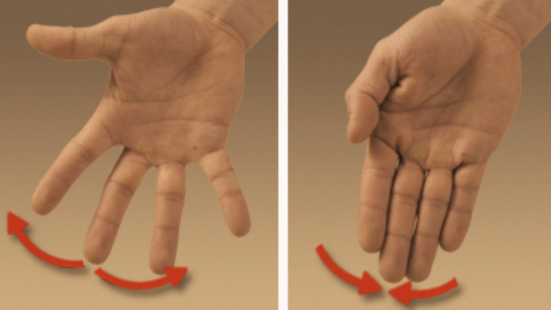 Close-up of left hand palm up with thumb extended outward, fingers together, showing hitchhiker thumb gesture, plain background