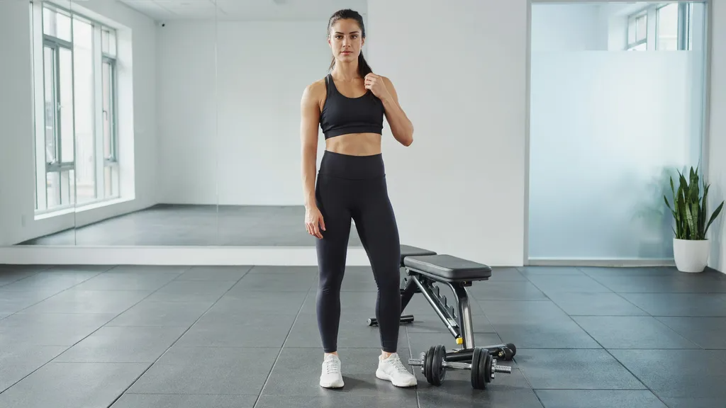 Maintaining proper posture before beginning the movement.