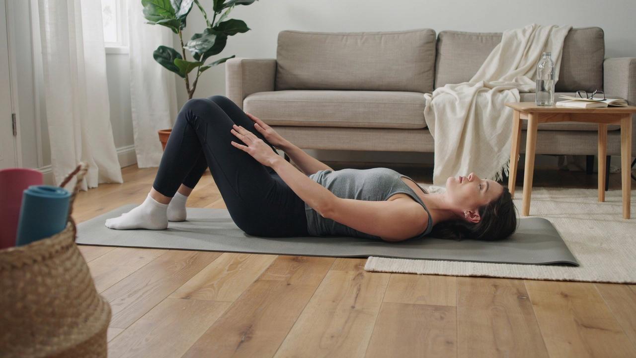 Lower trunk rotation stretch to improve pelvic mobility.